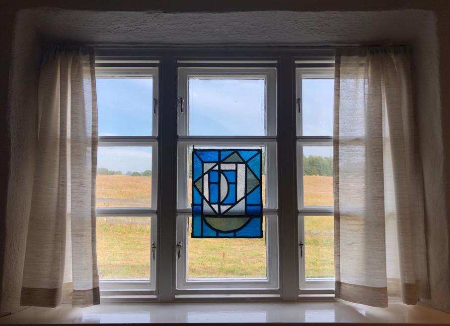 Window with a glass painting